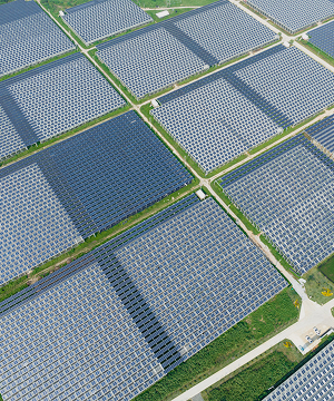 Aerial view of large-scale utility solar farm with neatly arranged PV modules, Solavita renewable project