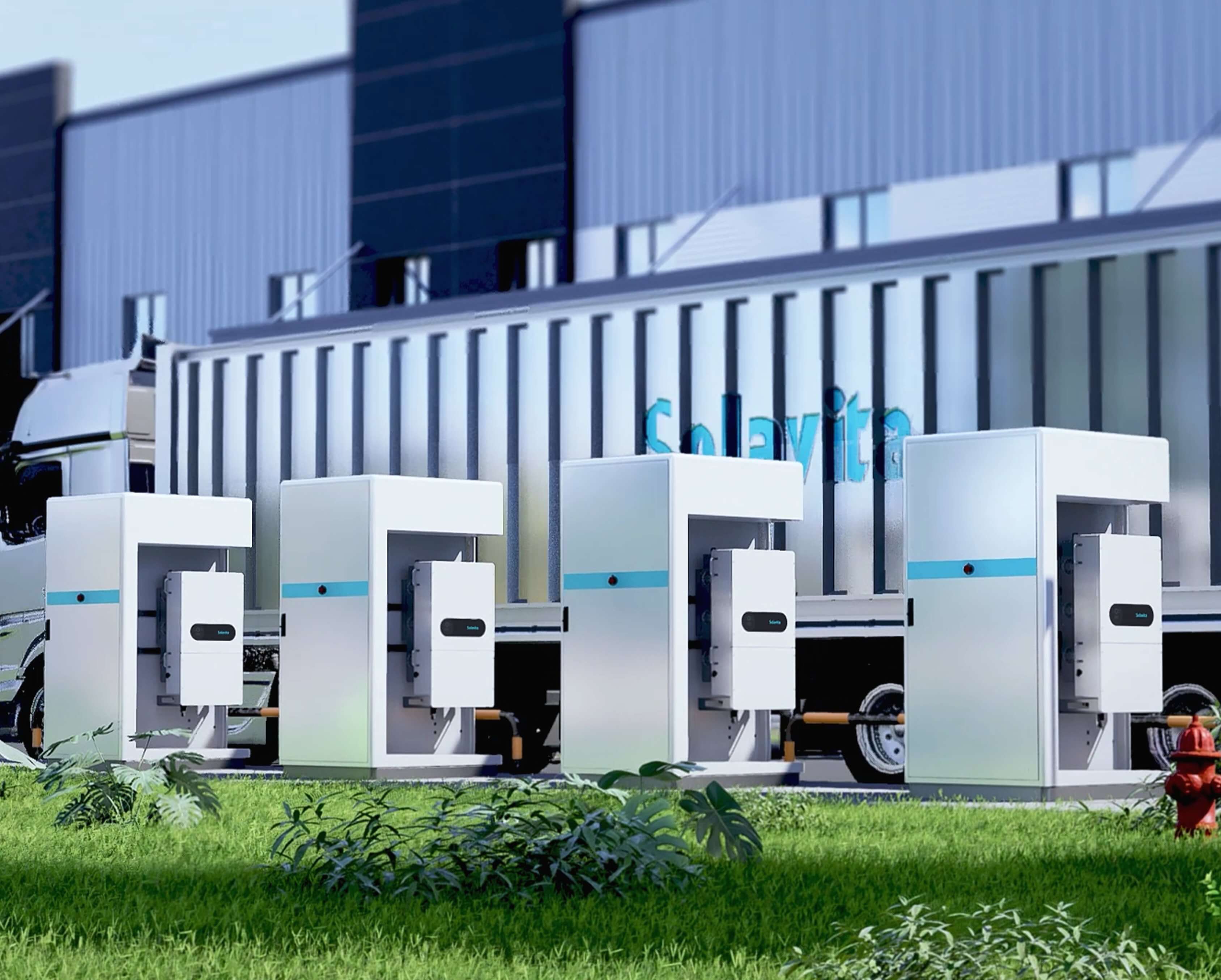 Solavita commercial energy storage systems in front of a transport truck, with green grass and a hydrant in the foreground